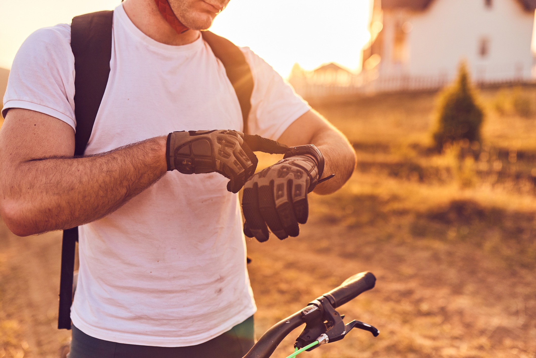 cyclist checks health in smartwatch