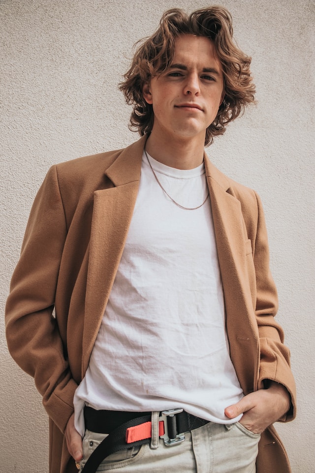 man in mocha colored blazer