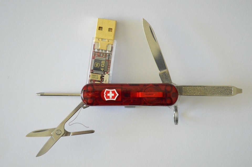 A Victorinox Swiss army knife with a 4 GB USB stick as one of its tools