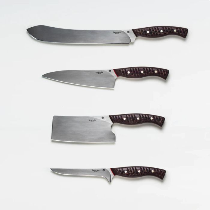 A Picture of Red and Silver Kitchen Knives