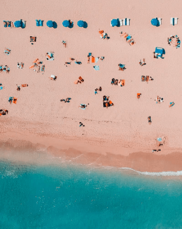 Picture of people at the beach on a summer day.