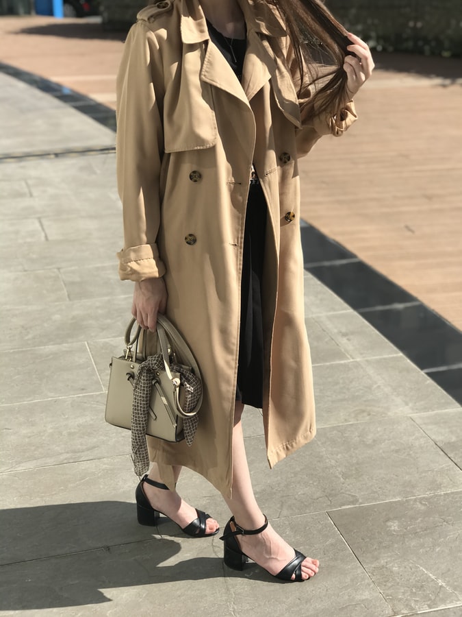 person wearing a trench coat
