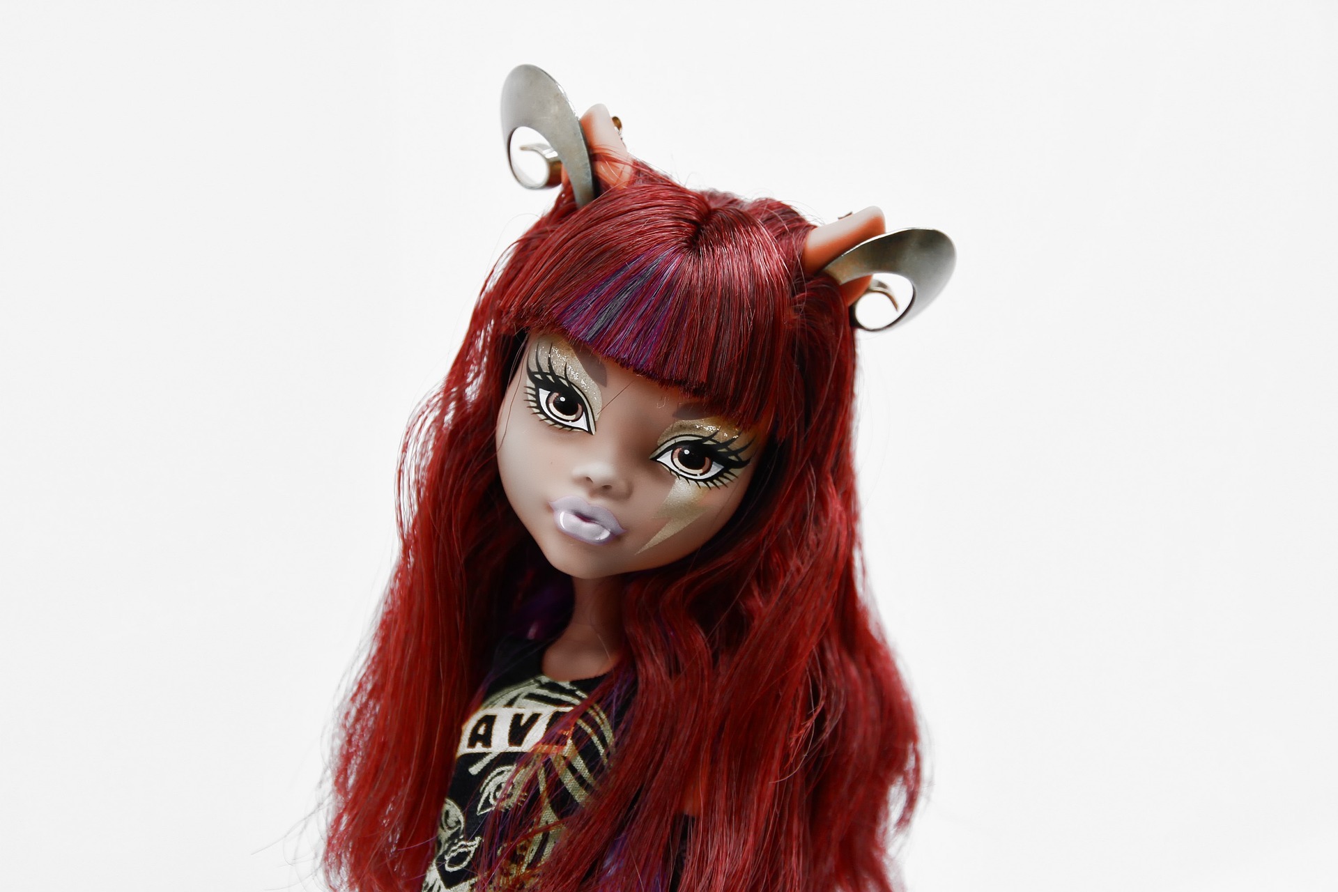 Close-up shot of Monster High doll wearing a head accessory