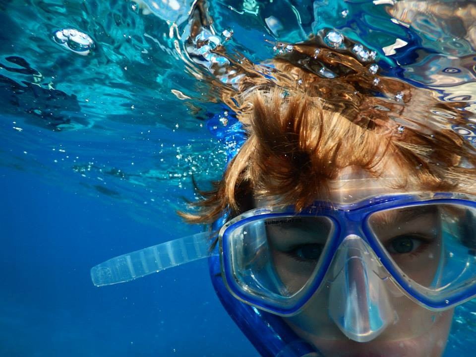 A person snorkeling in the ocean
