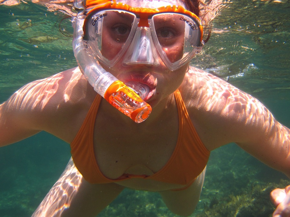 A young woman snorkeling